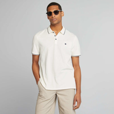 Polo uni en piqué de coton manches courtes BLANC