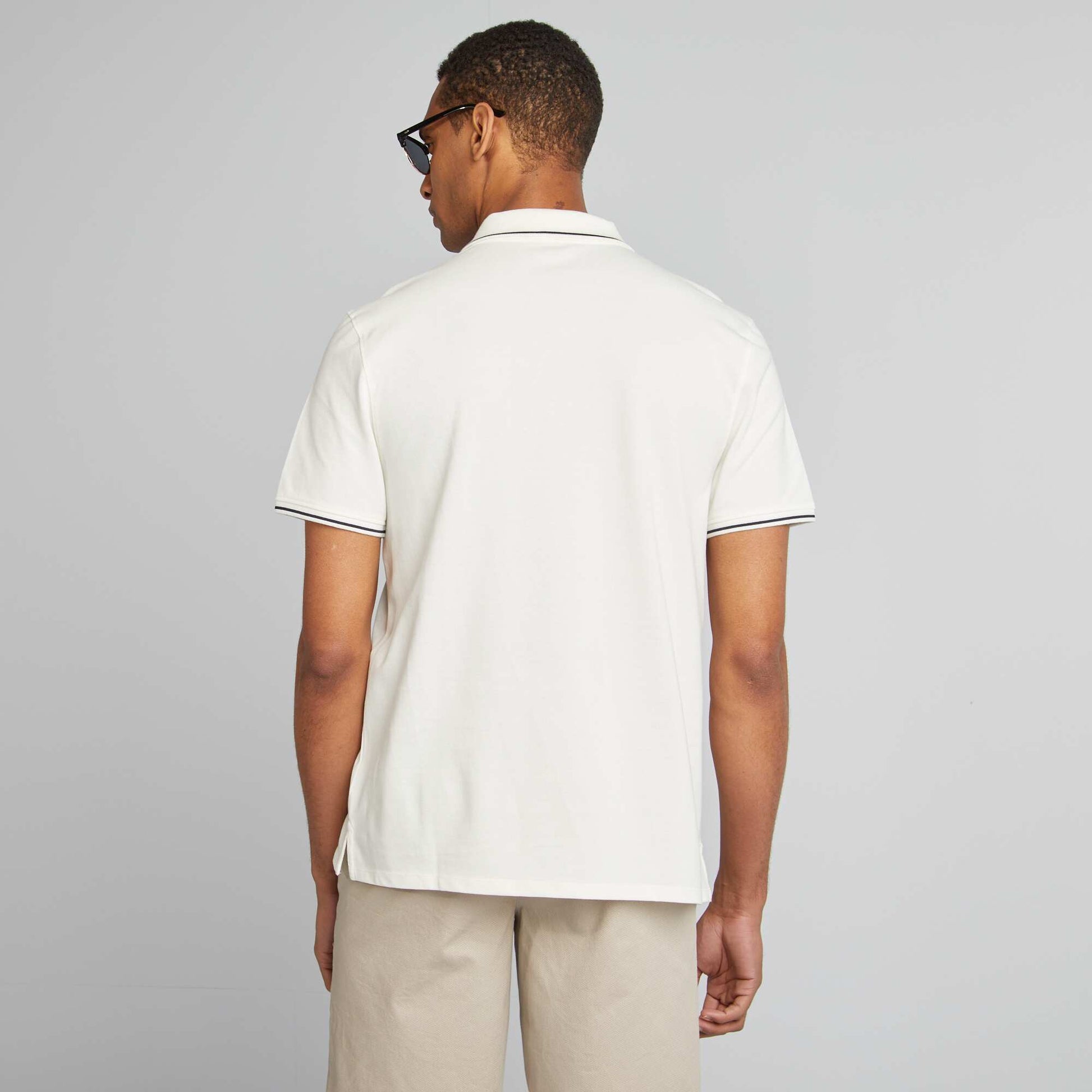 Polo uni en piqué de coton manches courtes BLANC