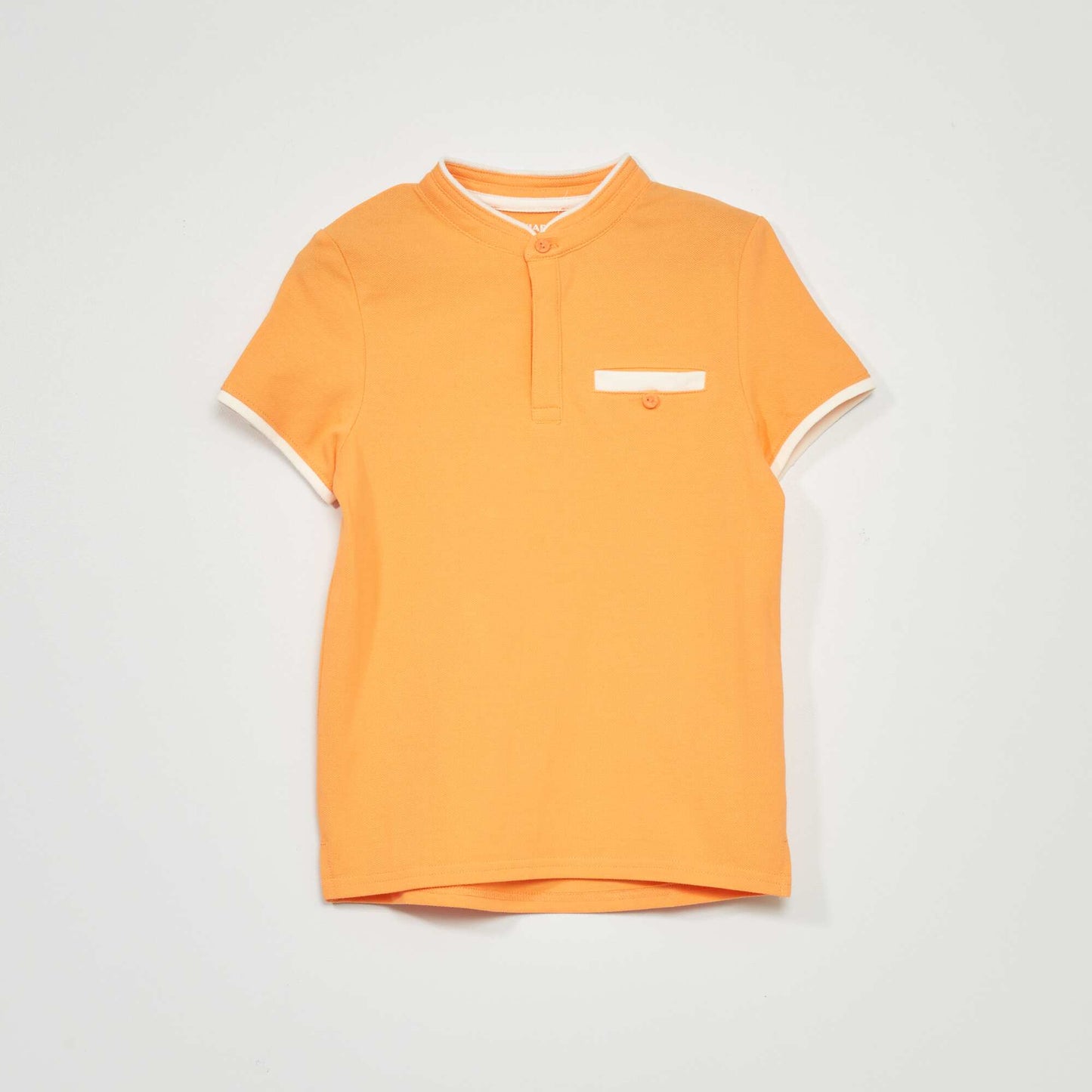 Polo en piqué de coton orange abricot