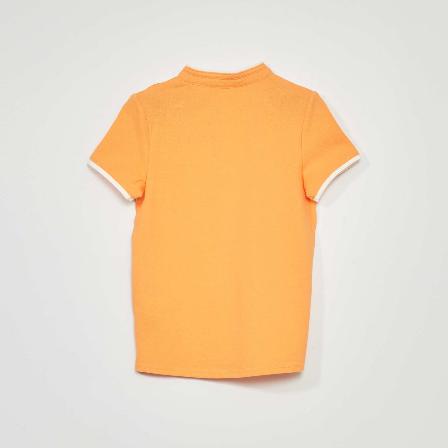 Polo en piqué de coton orange abricot